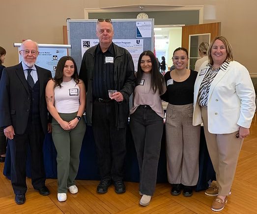 (L-R) Parker Small, Emily Mestas, Stephen Fischer, Sophia Peniche, Mylena Bovo, and Amy Maynard presenting at colloquium. (Photo courtesy of Mylena Bovo)