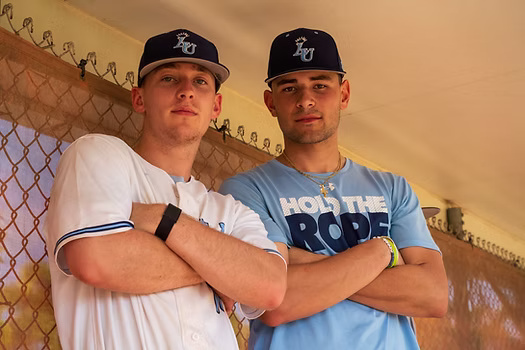 Brad Feeder (left) and Matthew Fletcher in the dugout before their game against Washington.