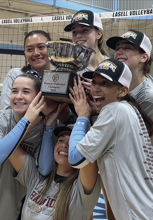(Clockwise from top left) Saige Cambonga-Meyers, Morgan Bogli, Sydney Katz, Autumn Walker, Camila Lopez, and Maddie Caro hold up the GNAC Championship trophy.