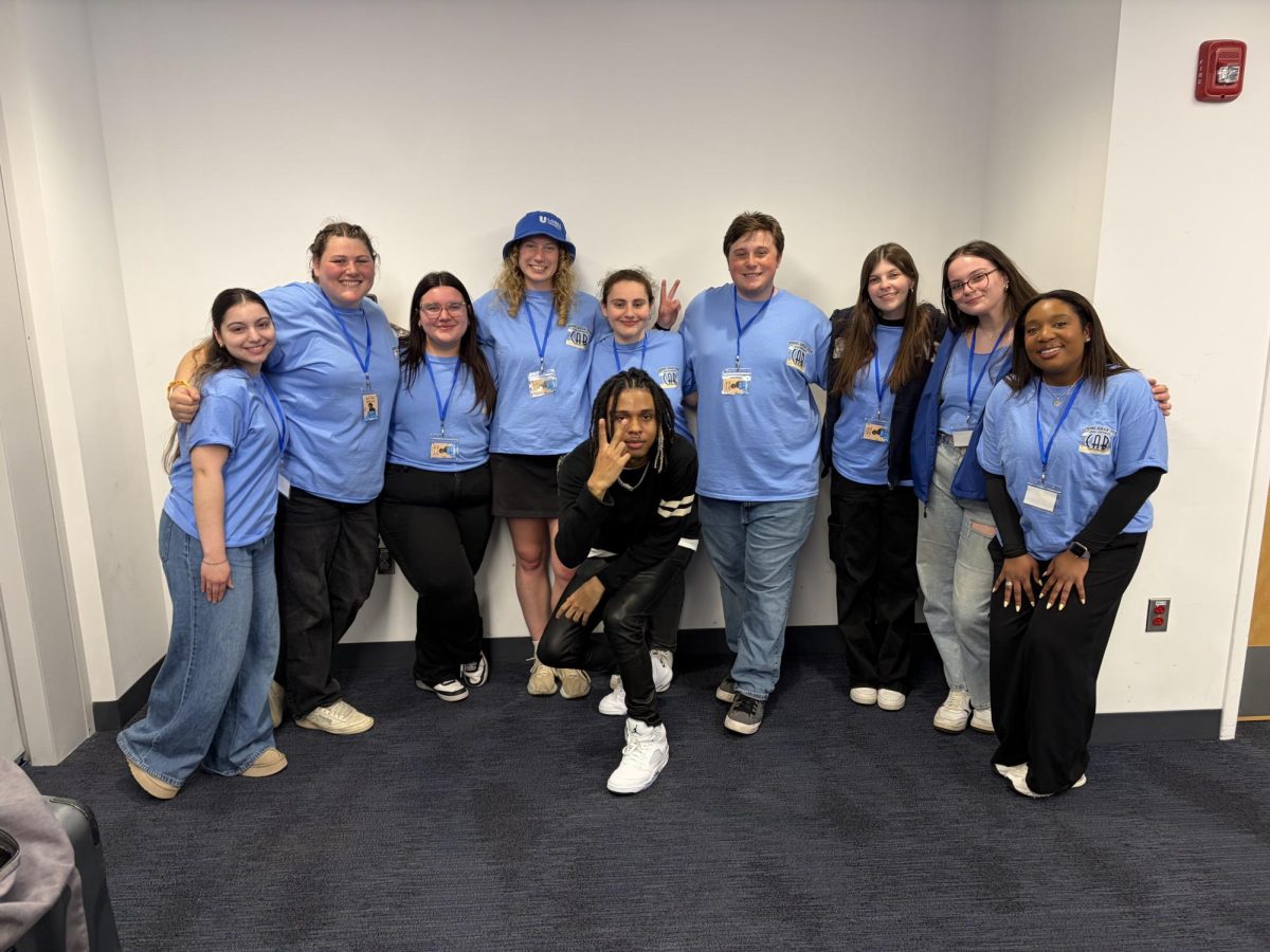 The Campus Activities Board executive board pose with SoFaygo, the 2026 Spring Concert headliner, on Monday, April 20, 2026