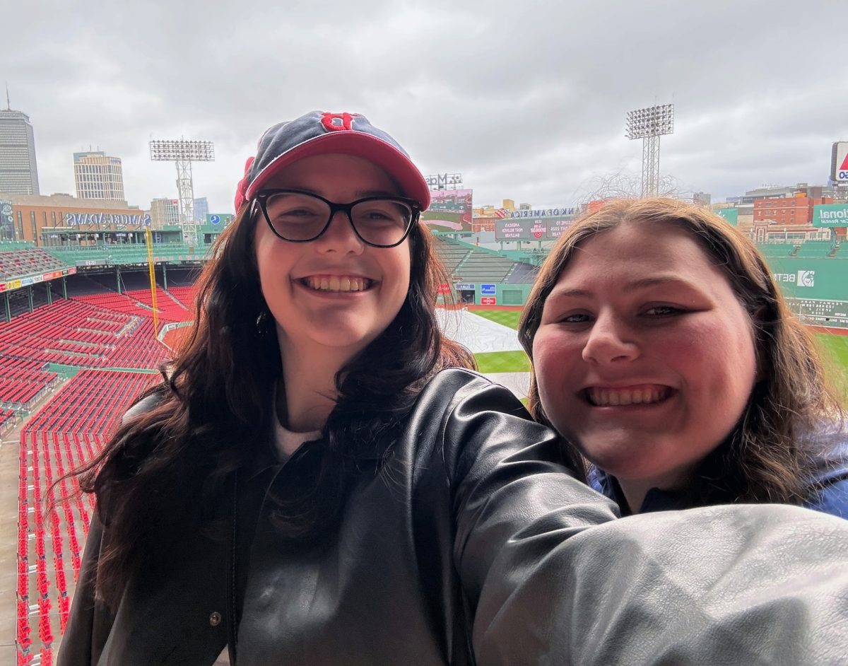Aria Conti (left) and Jenna Sargent, prepare to taste the new menu offerings available at Fenway Park in 2026.